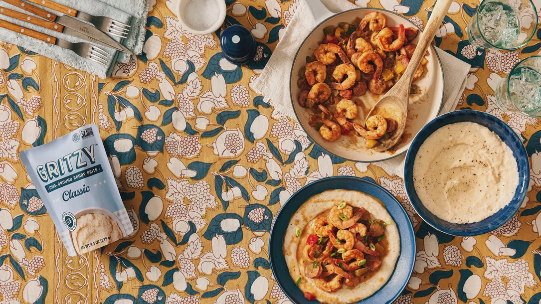 Gritzy Classic Grits breakfast spread with shrimp dish